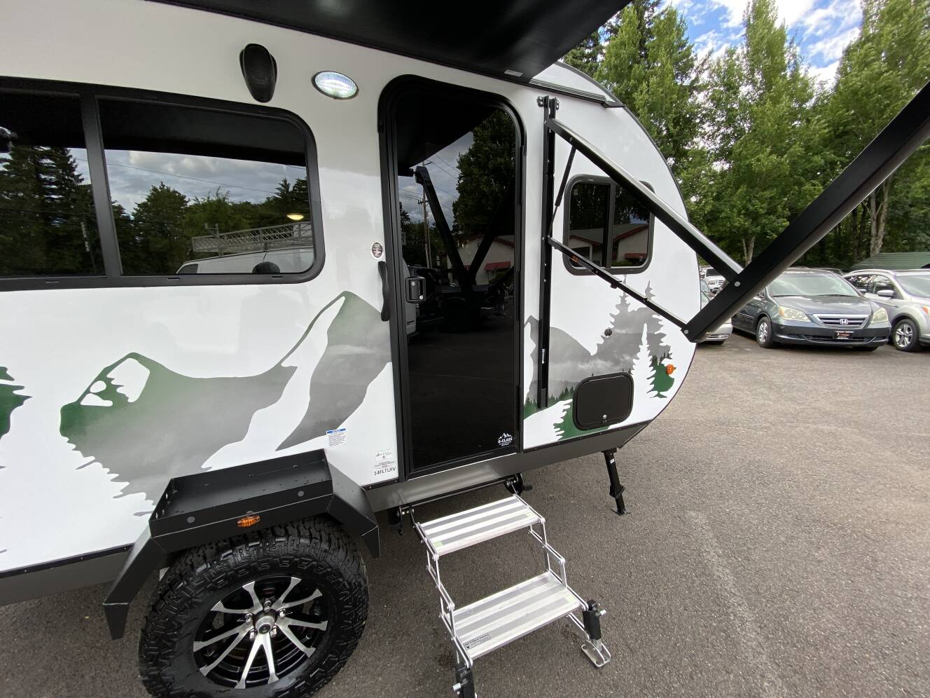 A photo of this 2025 Travel Lite ROVE LITE 14FL Off-Road
