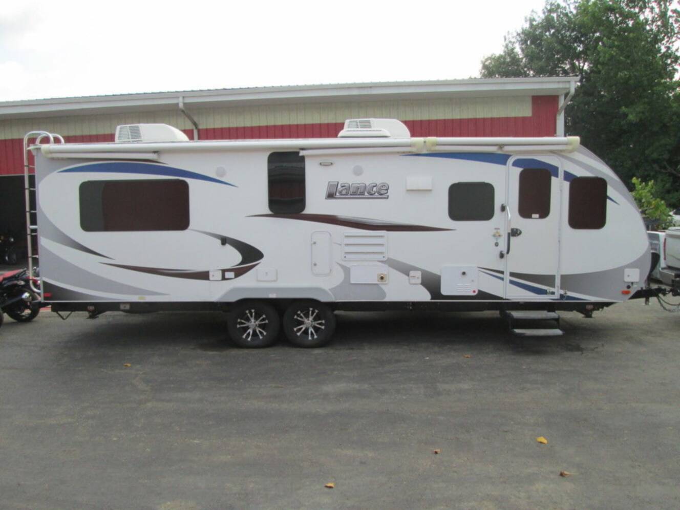 A photo of this 2020 Lance 2465 PULL CAMPER