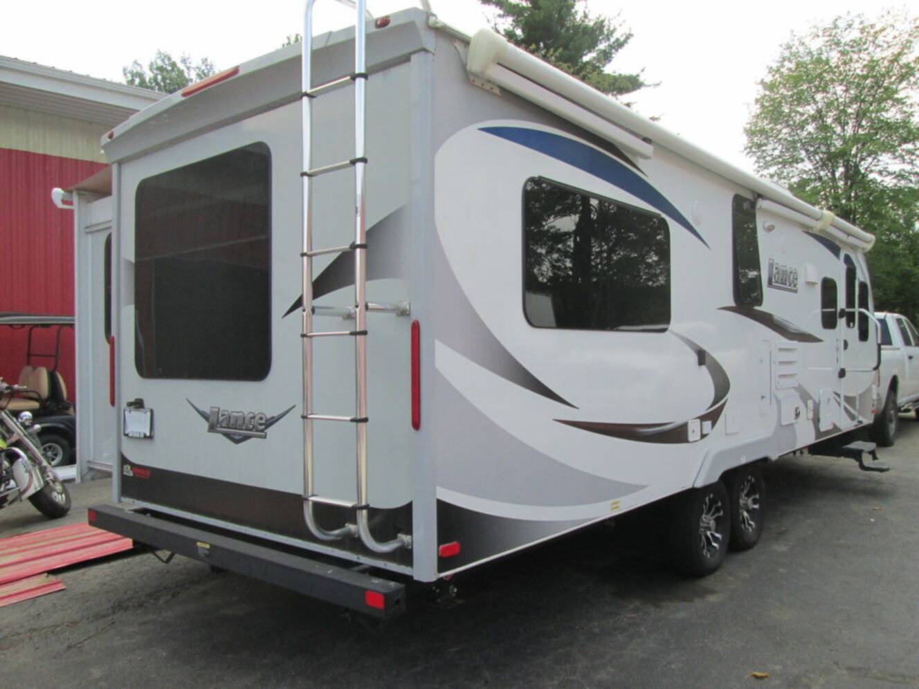 A photo of this 2020 Lance 2465 PULL CAMPER