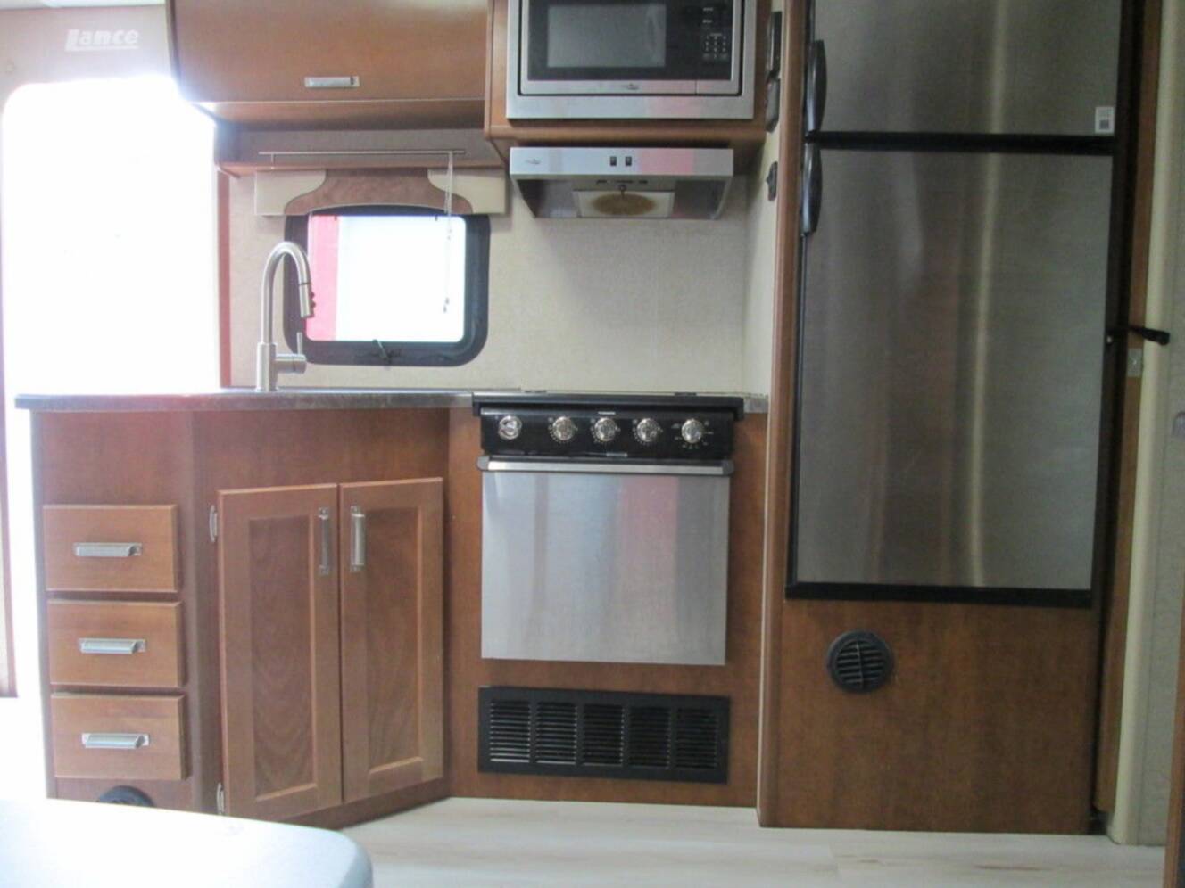 A photo of this 2020 Lance 2465 PULL CAMPER
