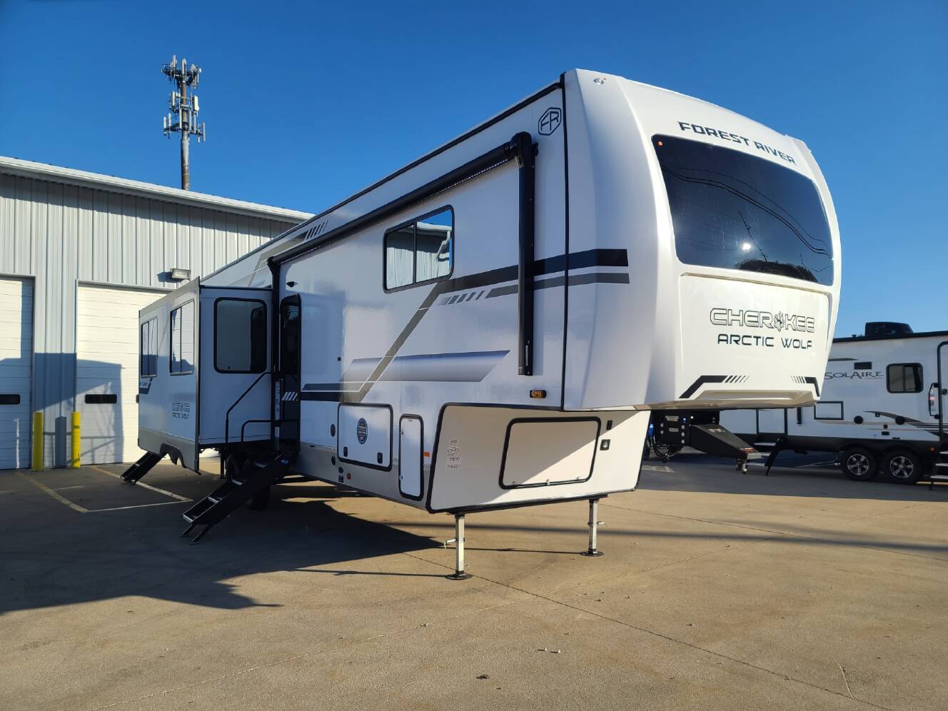 A photo of this 2025 Forest River Cherokee Arctic Wolf 3800DECK