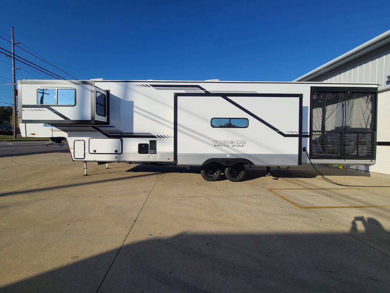 A photo of this 2025 Forest River Cherokee Arctic Wolf 3800DECK