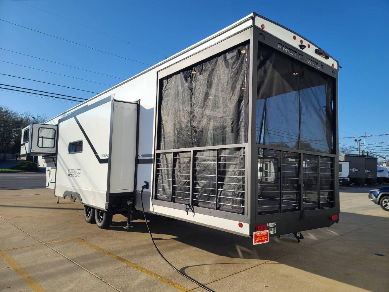 A photo of this 2025 Forest River Cherokee Arctic Wolf 3800DECK