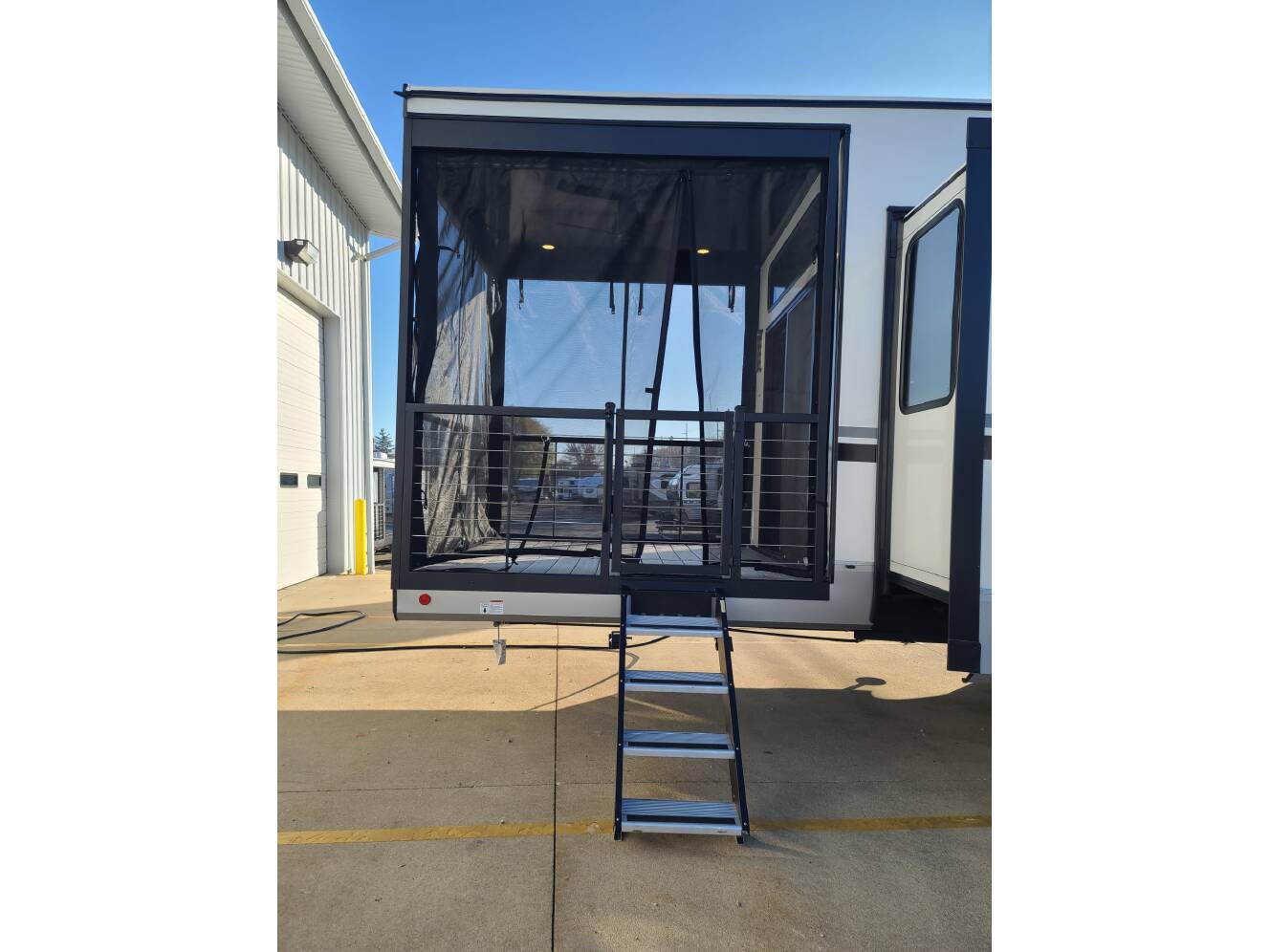 A photo of this 2025 Forest River Cherokee Arctic Wolf 3800DECK