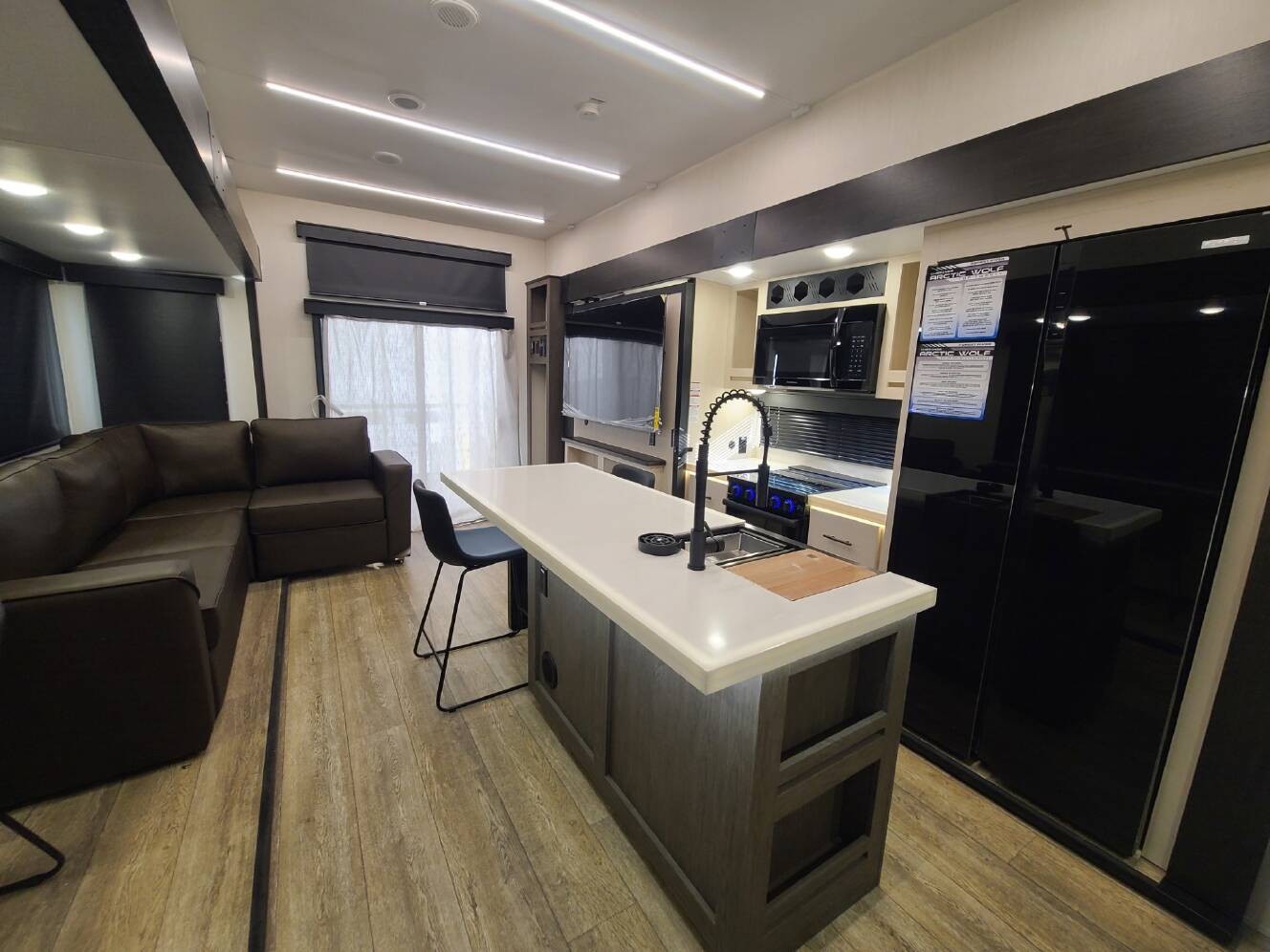 A photo of this 2025 Forest River Cherokee Arctic Wolf 3800DECK
