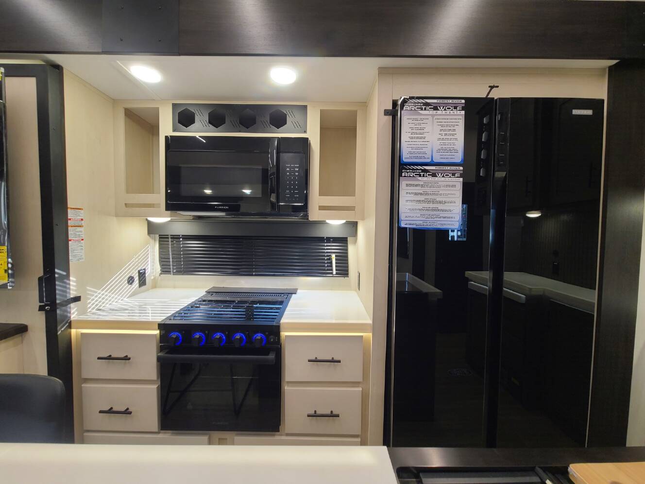 A photo of this 2025 Forest River Cherokee Arctic Wolf 3800DECK