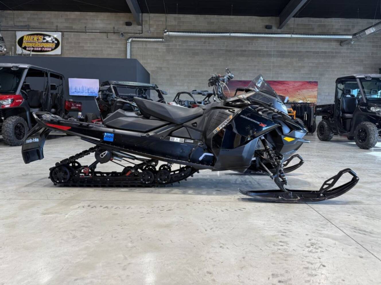 A photo of this 2023 Ski-Doo Renegade® X® 850 E-TEC Ice Ripper XT 1.25_10.25 in. /