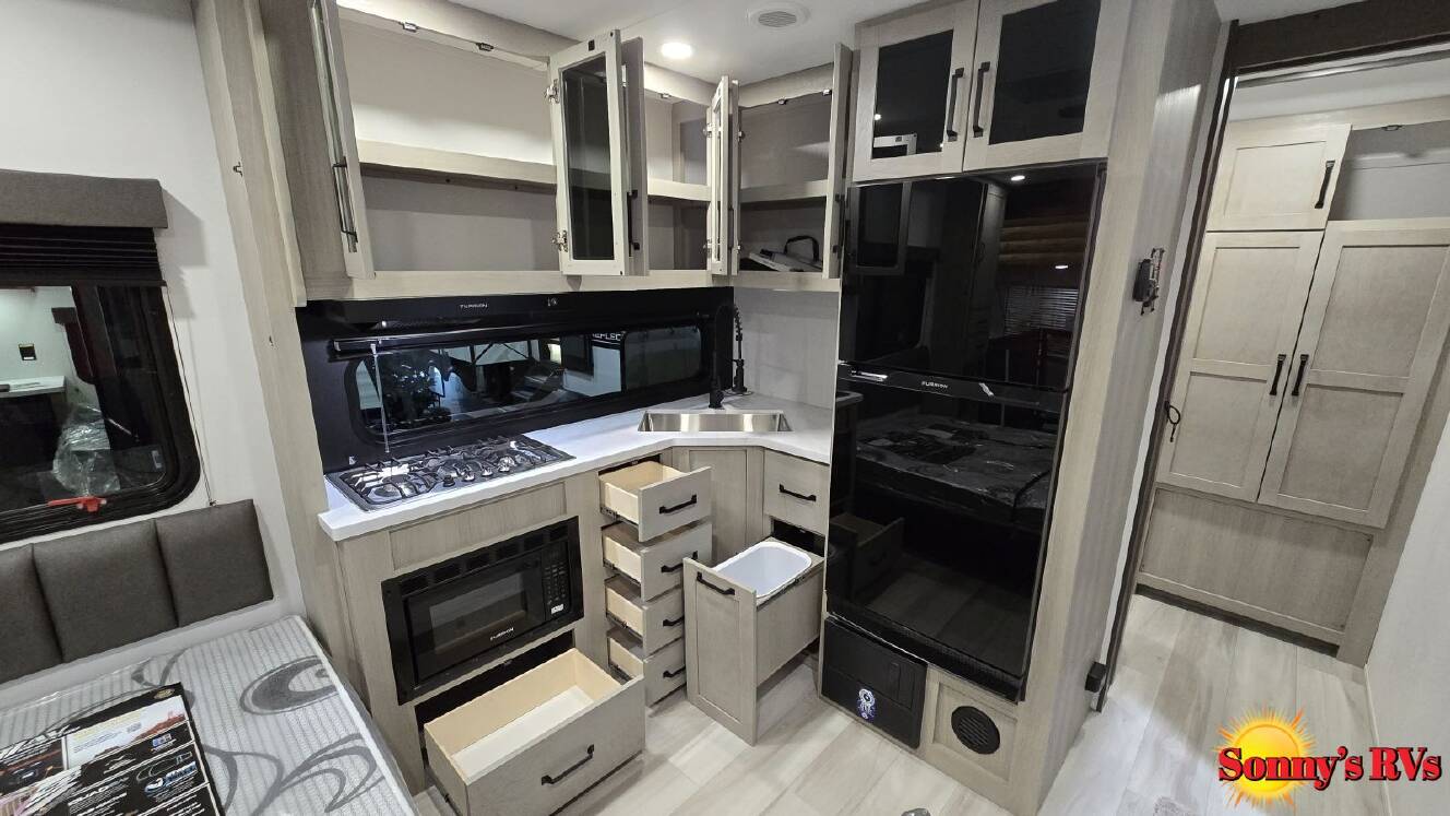 A photo of this 2026 Grand Design MOMENTUM 17MAV