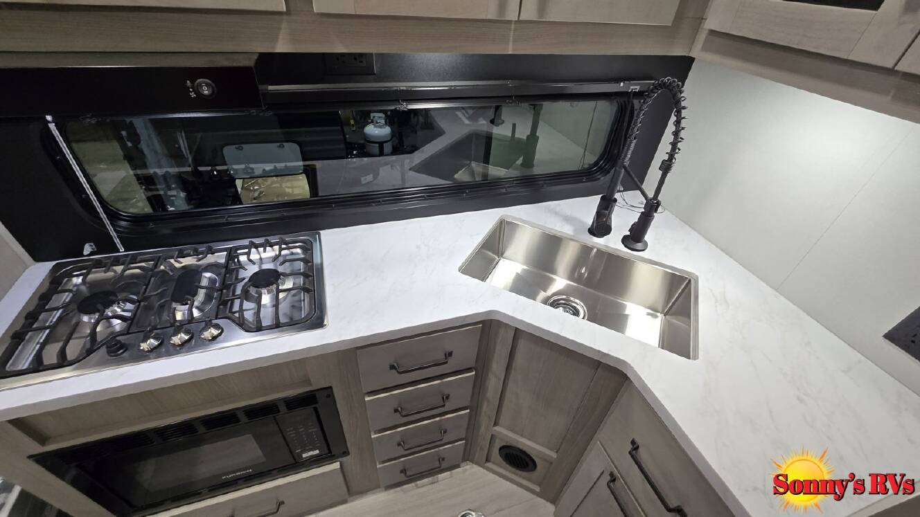 A photo of this 2026 Grand Design MOMENTUM 17MAV