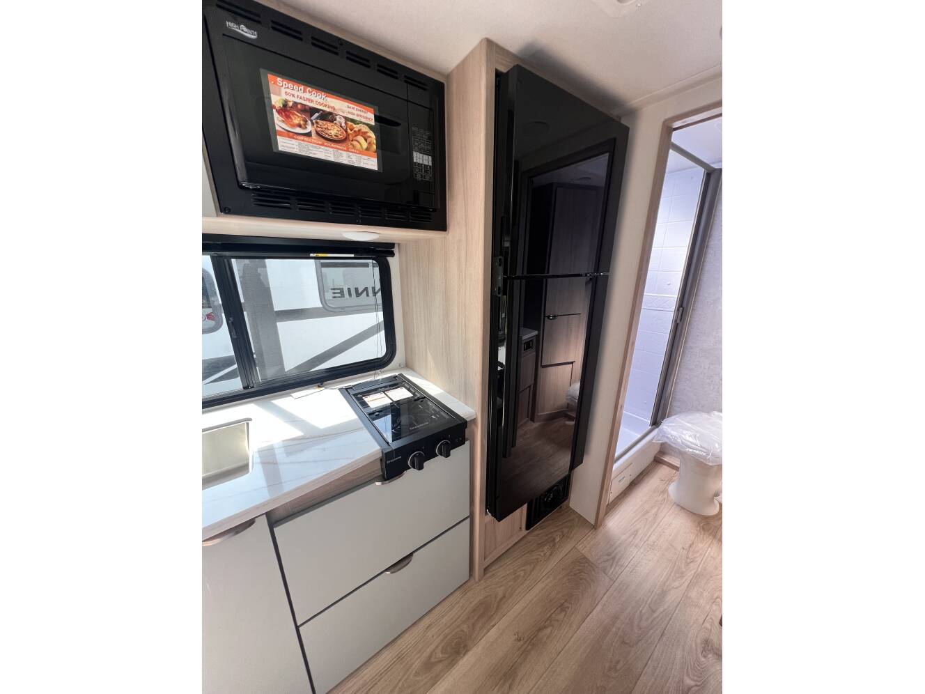 A photo of this 2025 Winnebago MICRO MINNIE 2108FBS