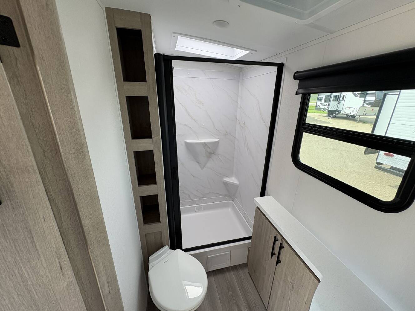 A photo of this 2026 Grand Design Imagine 2470BH
