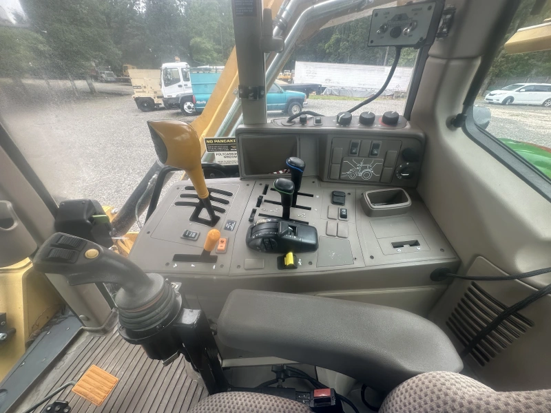 2015 JOHN DEERE 6115M