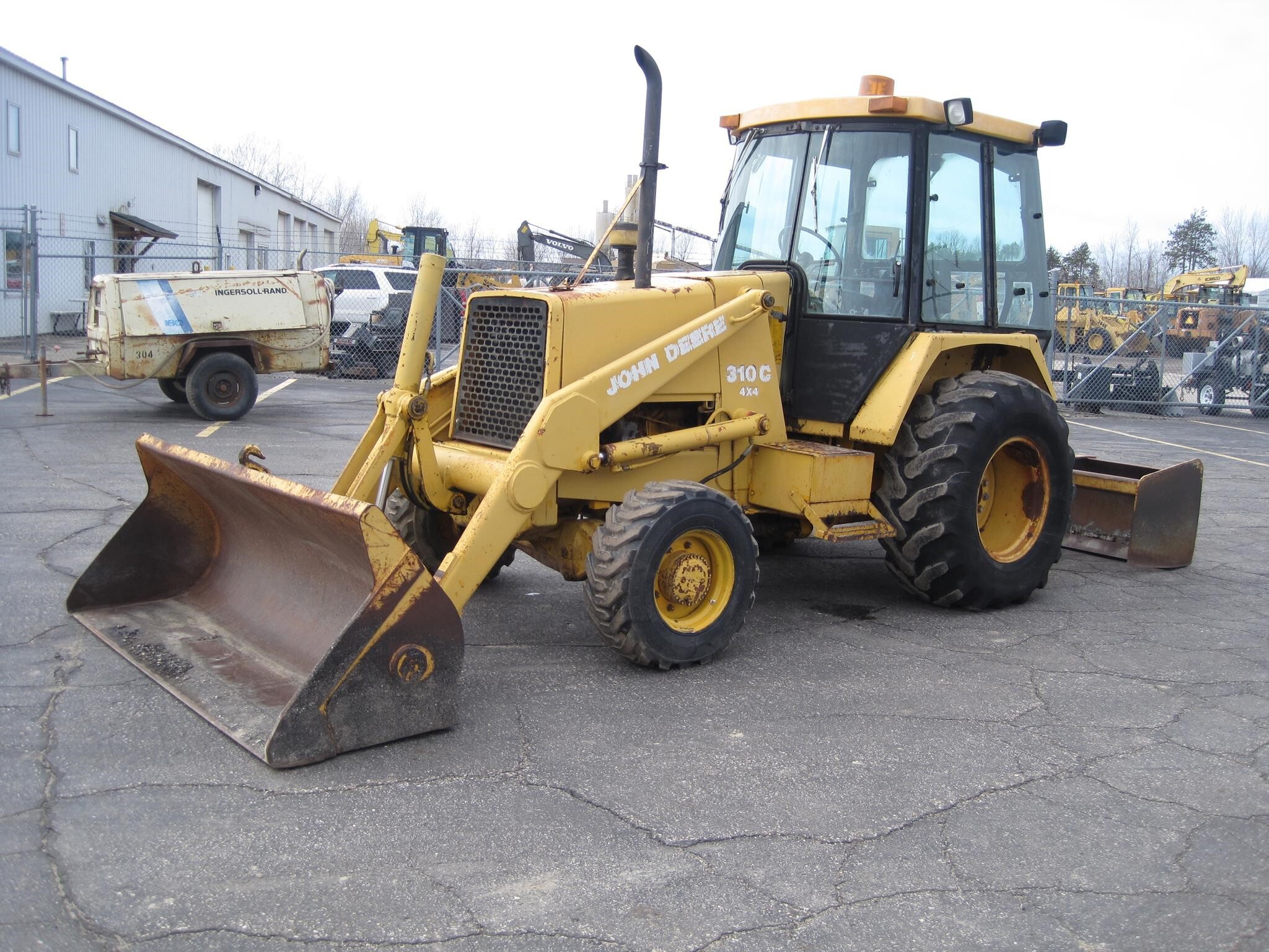 1987 DEERE 310C in Holland, MI