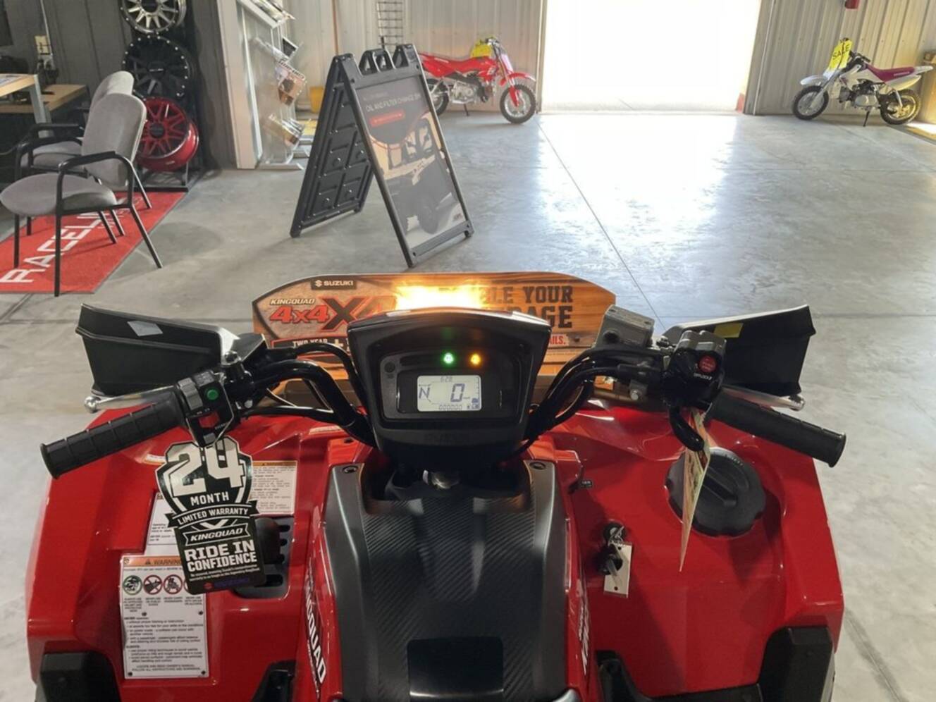 A photo of this 2025 Suzuki KINGQUAD 500 AXi Red
