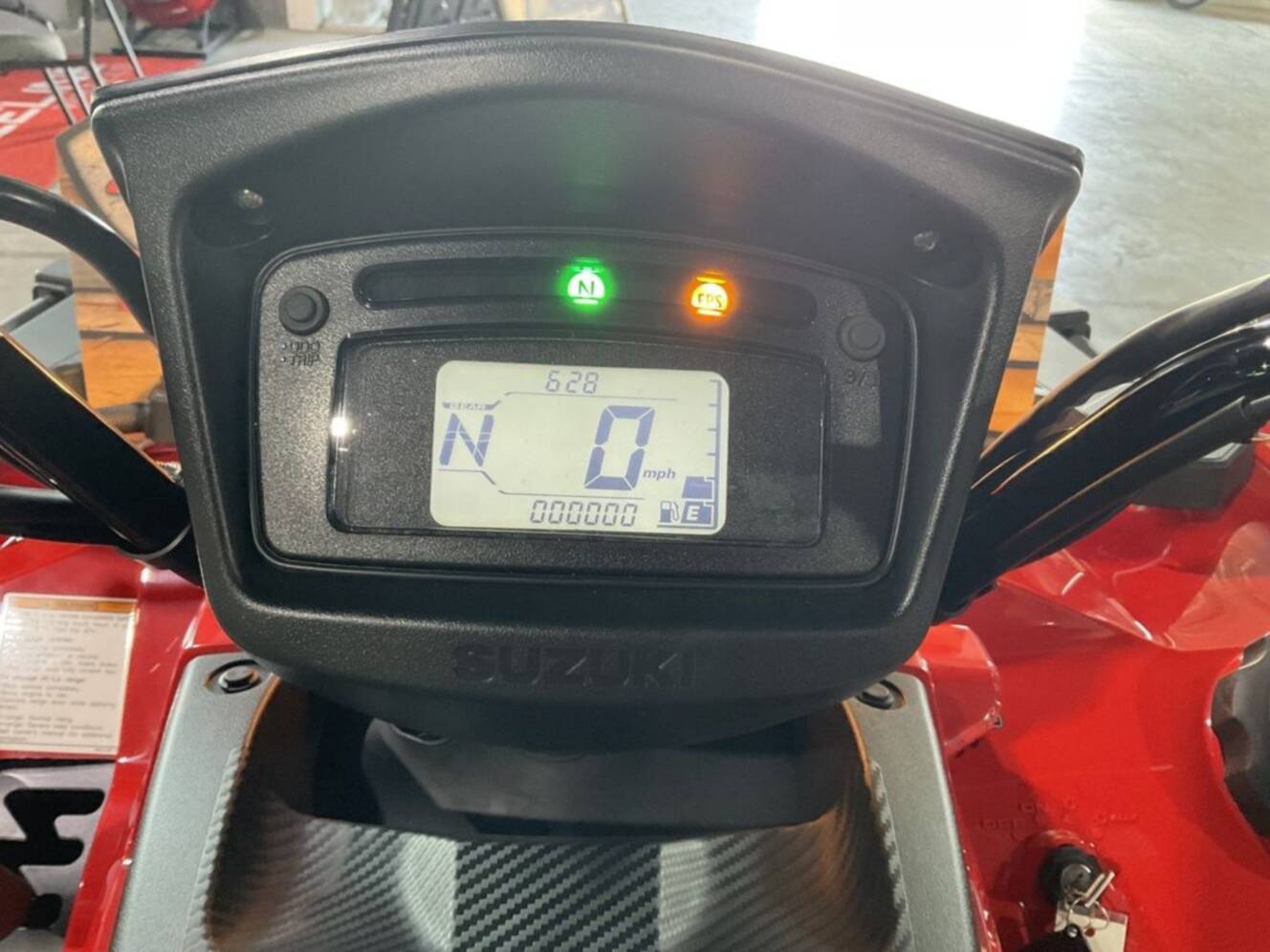 A photo of this 2025 Suzuki KINGQUAD 500 AXi Red