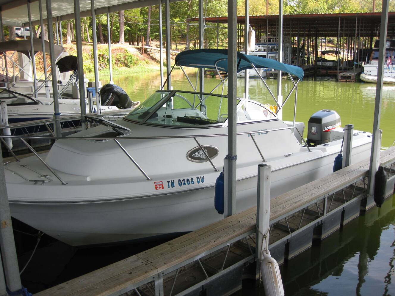 A photo of this 1999 Aquasport 215 Explorer