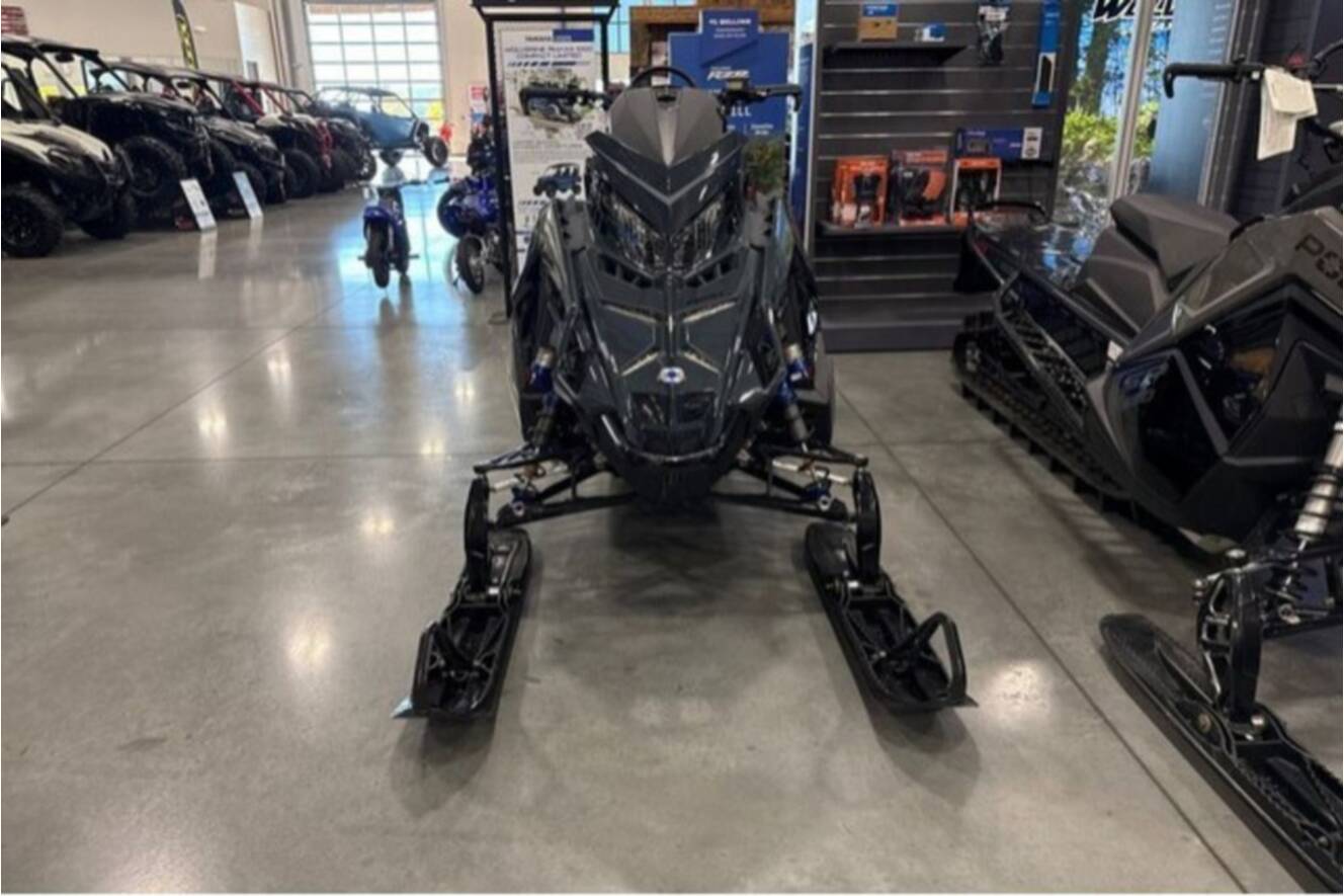 A photo of this 2026 Polaris® SNO-26 BOOST RMK KHAOS 155 Patriot Boost