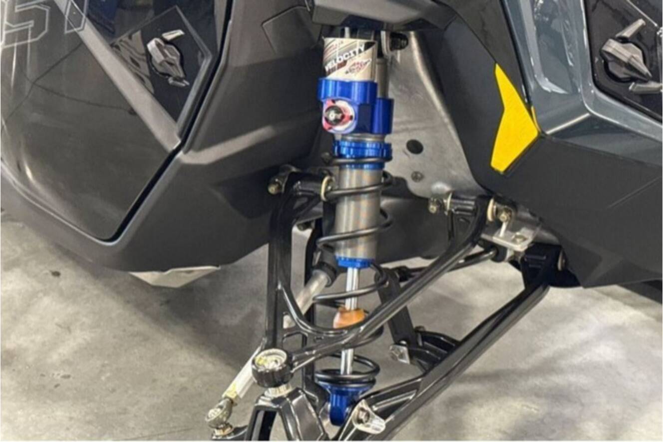 A photo of this 2026 Polaris® SNO-26 BOOST RMK KHAOS 155 Patriot Boost
