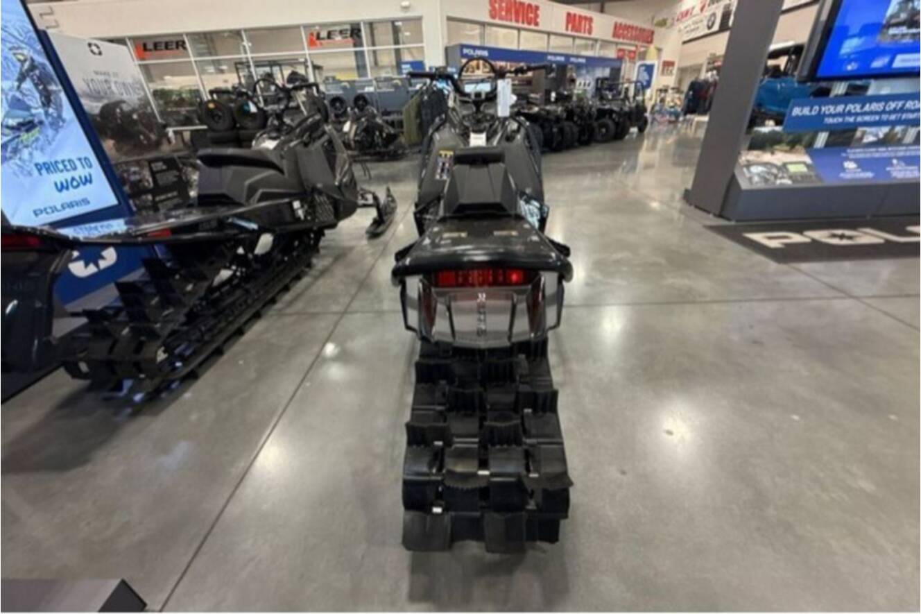A photo of this 2026 Polaris® SNO-26 BOOST RMK KHAOS 155 Patriot Boost