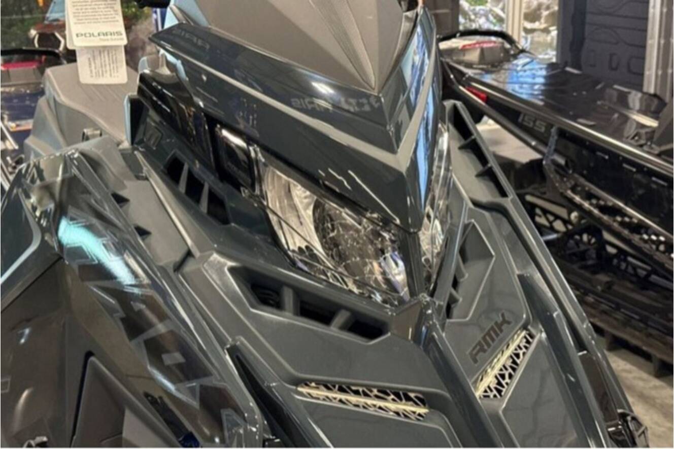 A photo of this 2026 Polaris® SNO-26 BOOST RMK KHAOS 155 Patriot Boost