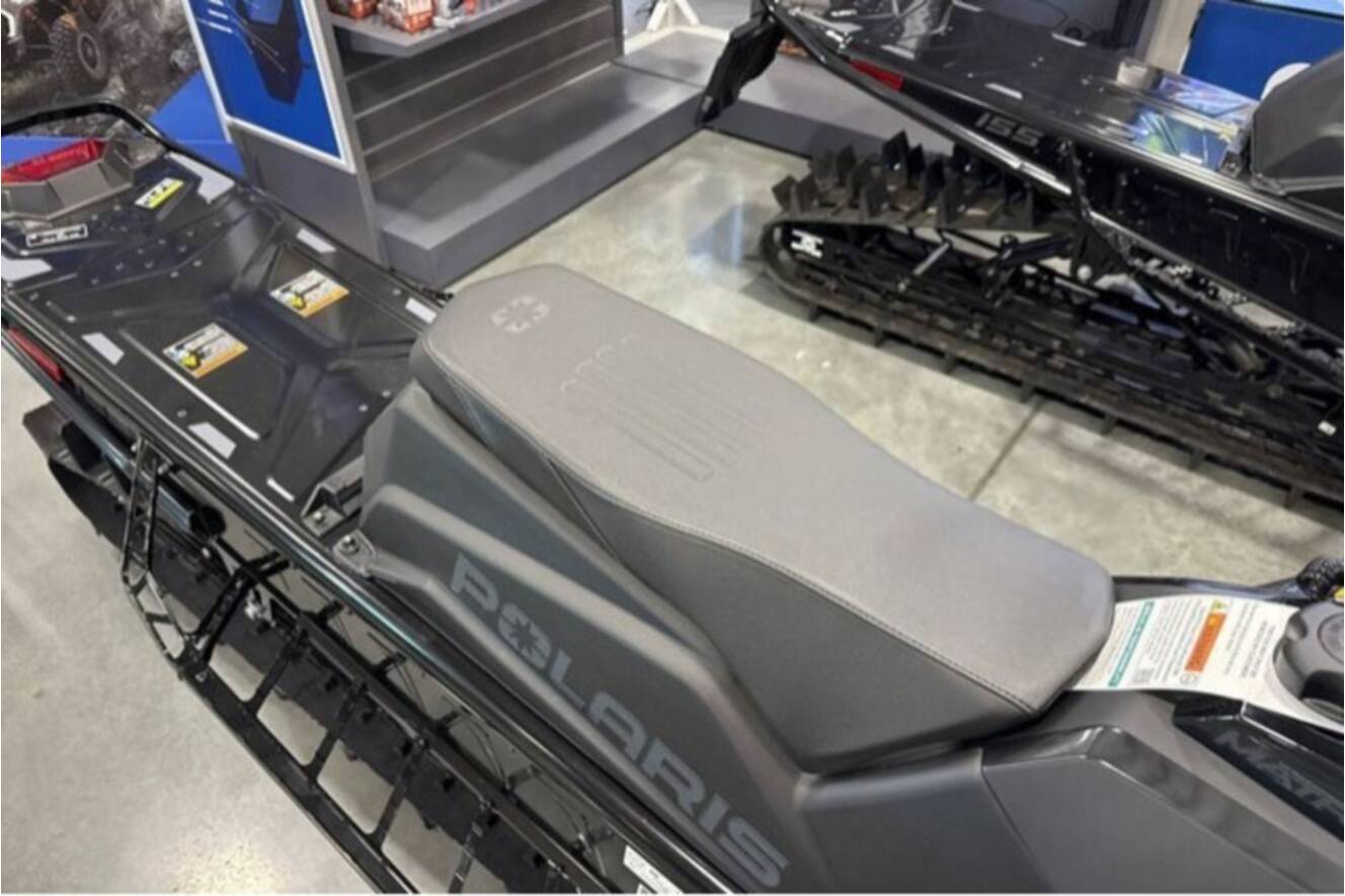 A photo of this 2026 Polaris® SNO-26 BOOST RMK KHAOS 155 Patriot Boost