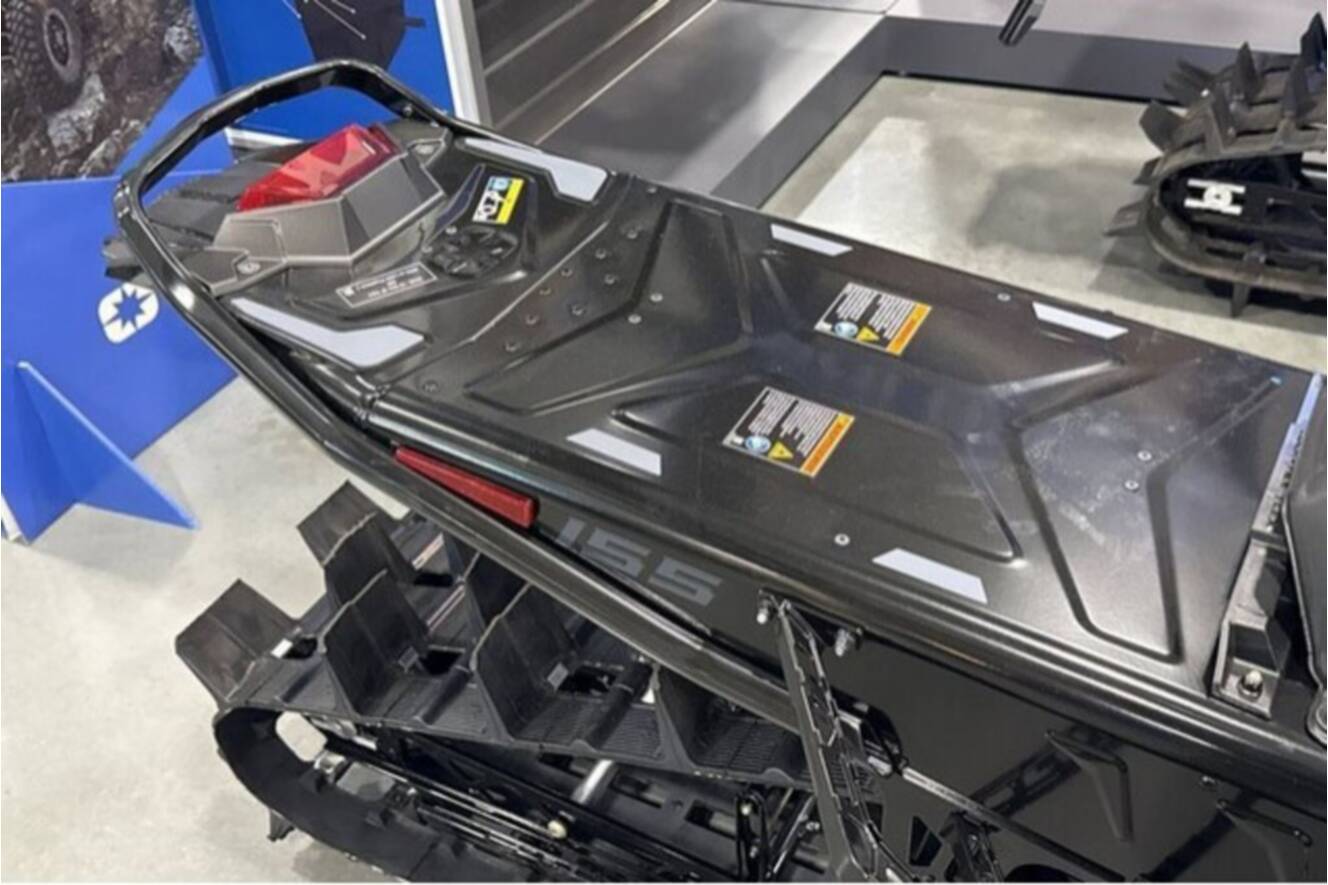 A photo of this 2026 Polaris® SNO-26 BOOST RMK KHAOS 155 Patriot Boost