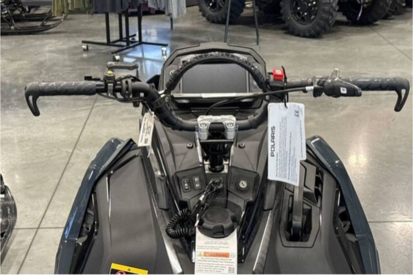 A photo of this 2026 Polaris® SNO-26 BOOST RMK KHAOS 155 Patriot Boost