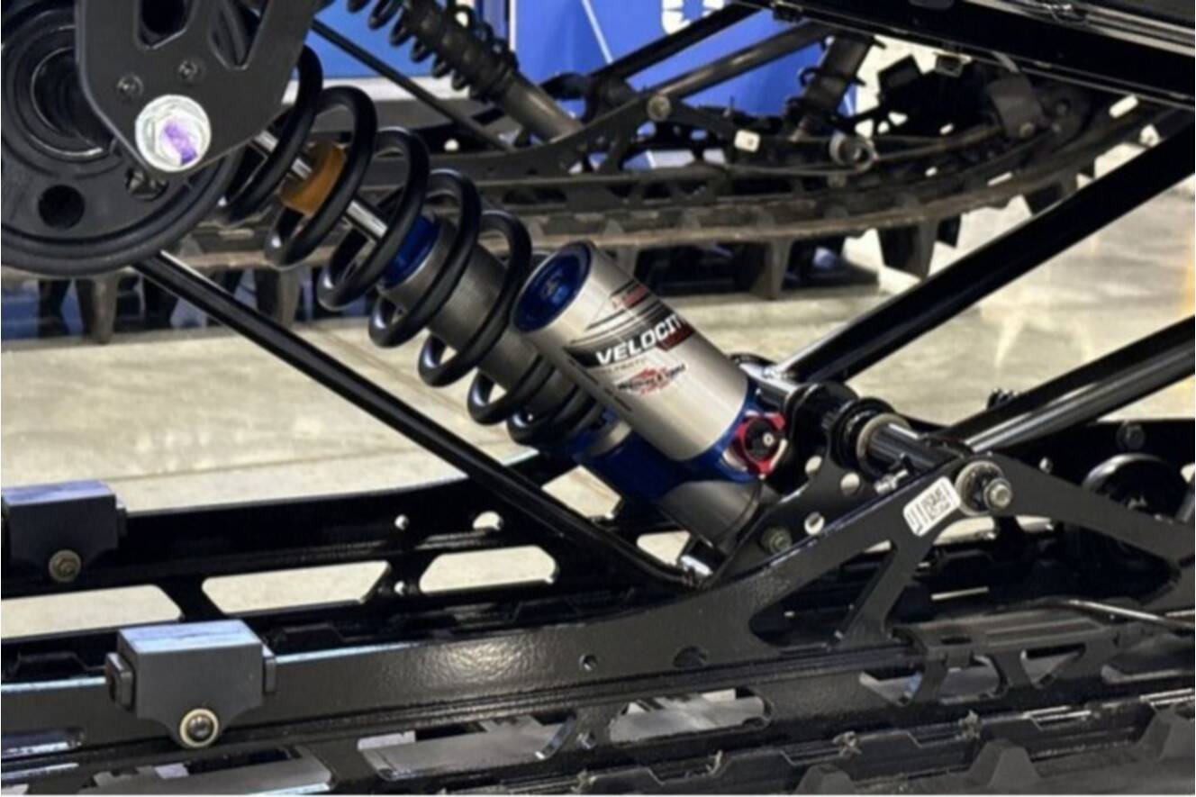 A photo of this 2026 Polaris® SNO-26 BOOST RMK KHAOS 155 Patriot Boost