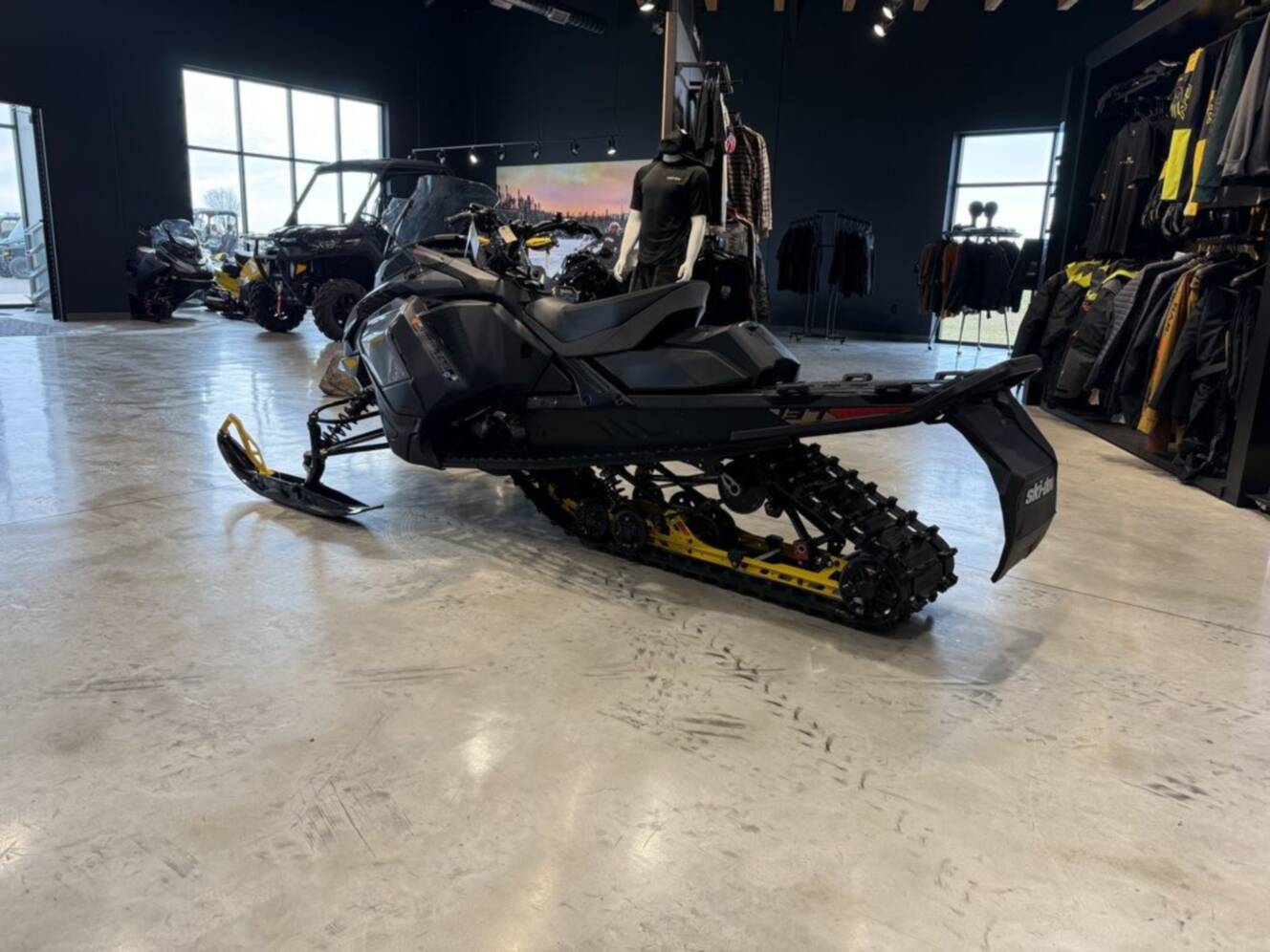 A photo of this 2025 Ski-Doo Renegade® Adrenaline® 900 ACE Turbo RipSaw 1.25_Grey