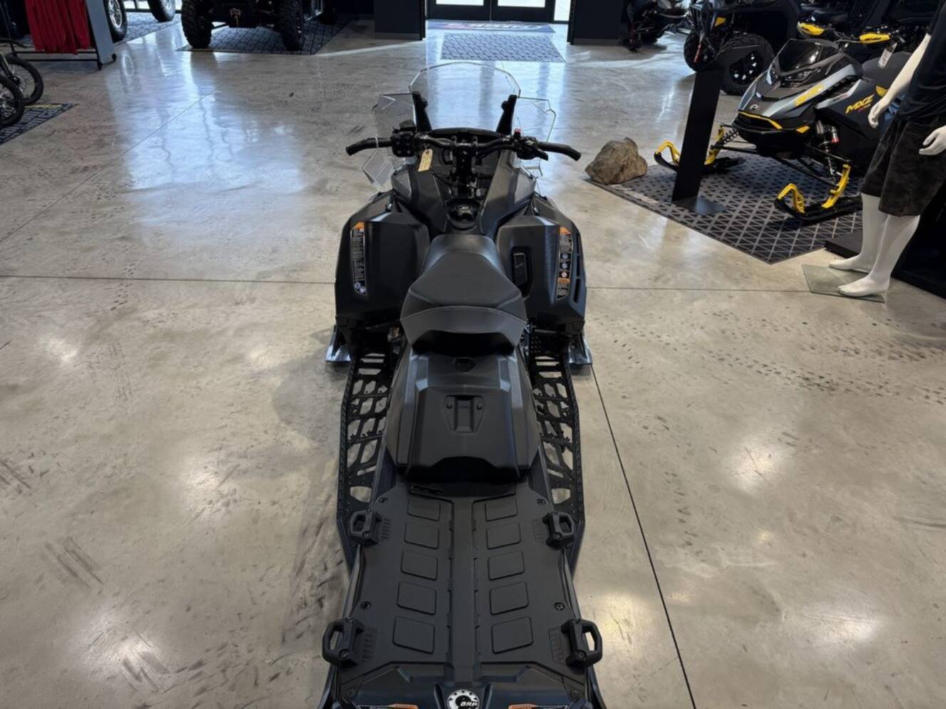 A photo of this 2025 Ski-Doo Renegade® Adrenaline® 900 ACE Turbo RipSaw 1.25_Grey