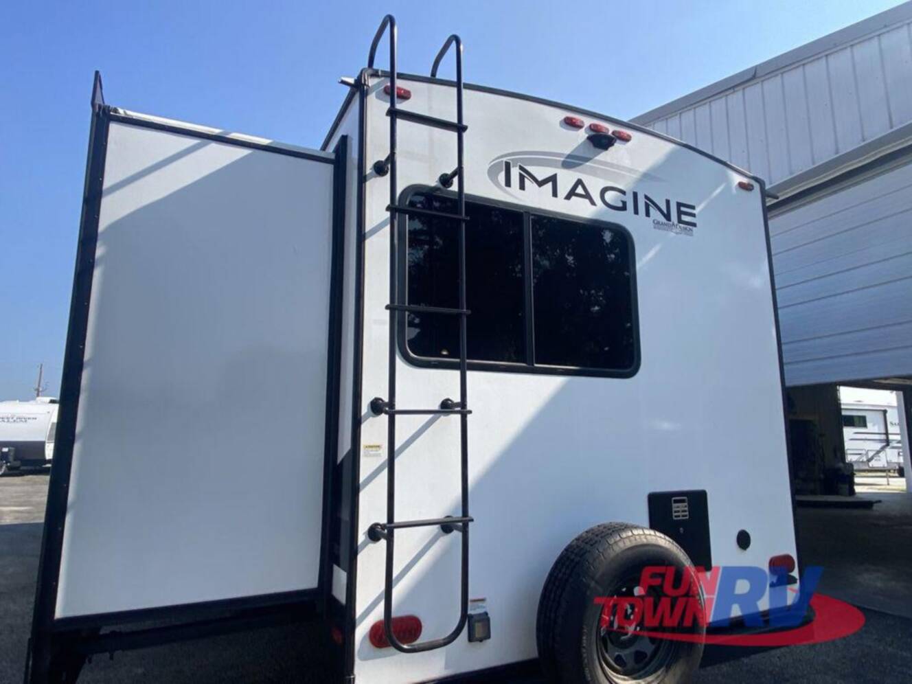 A photo of this 2023 Grand Design Imagine 3250BH