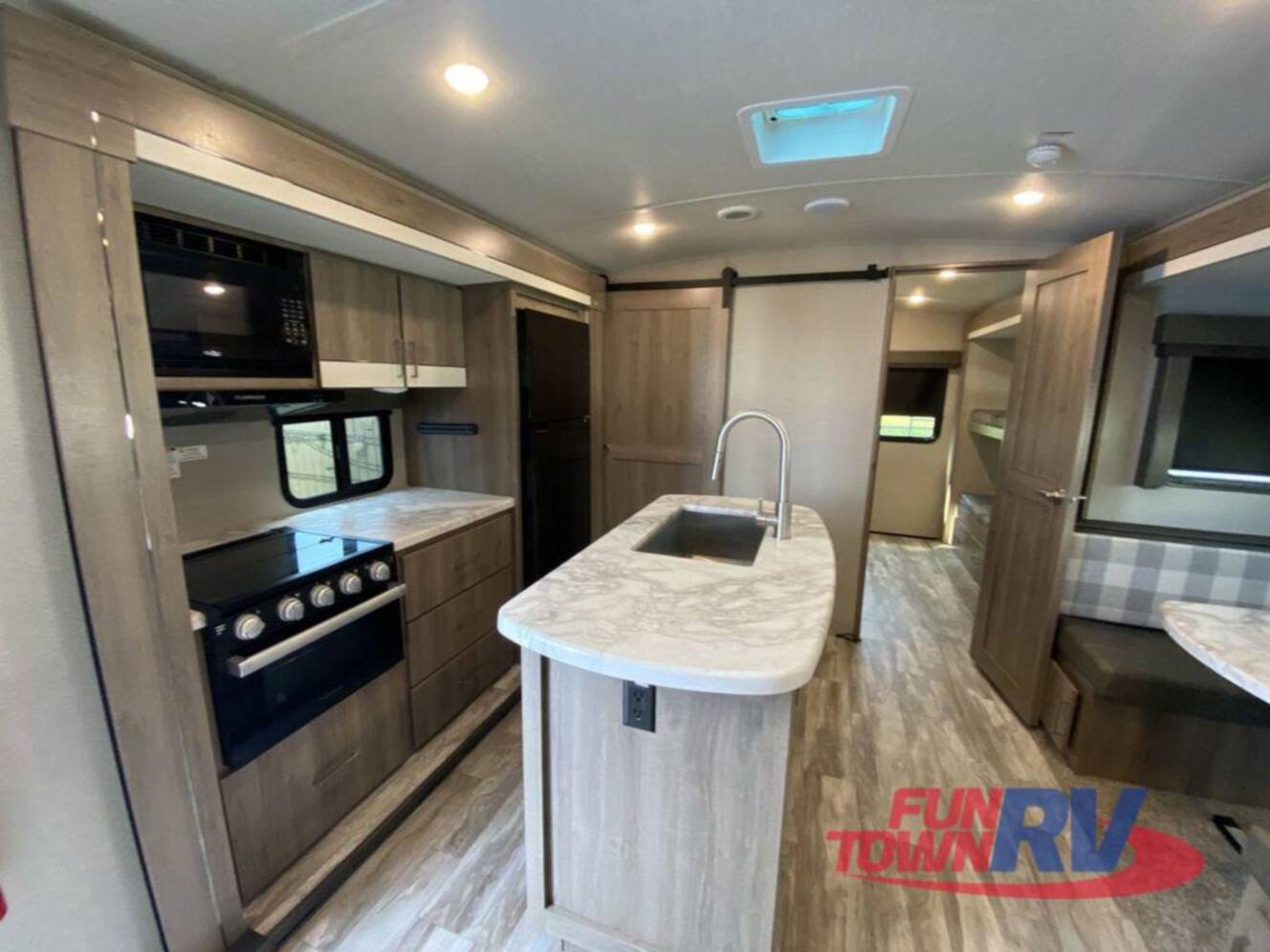 A photo of this 2023 Grand Design Imagine 3250BH