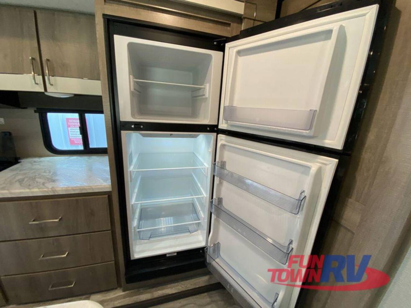 A photo of this 2023 Grand Design Imagine 3250BH