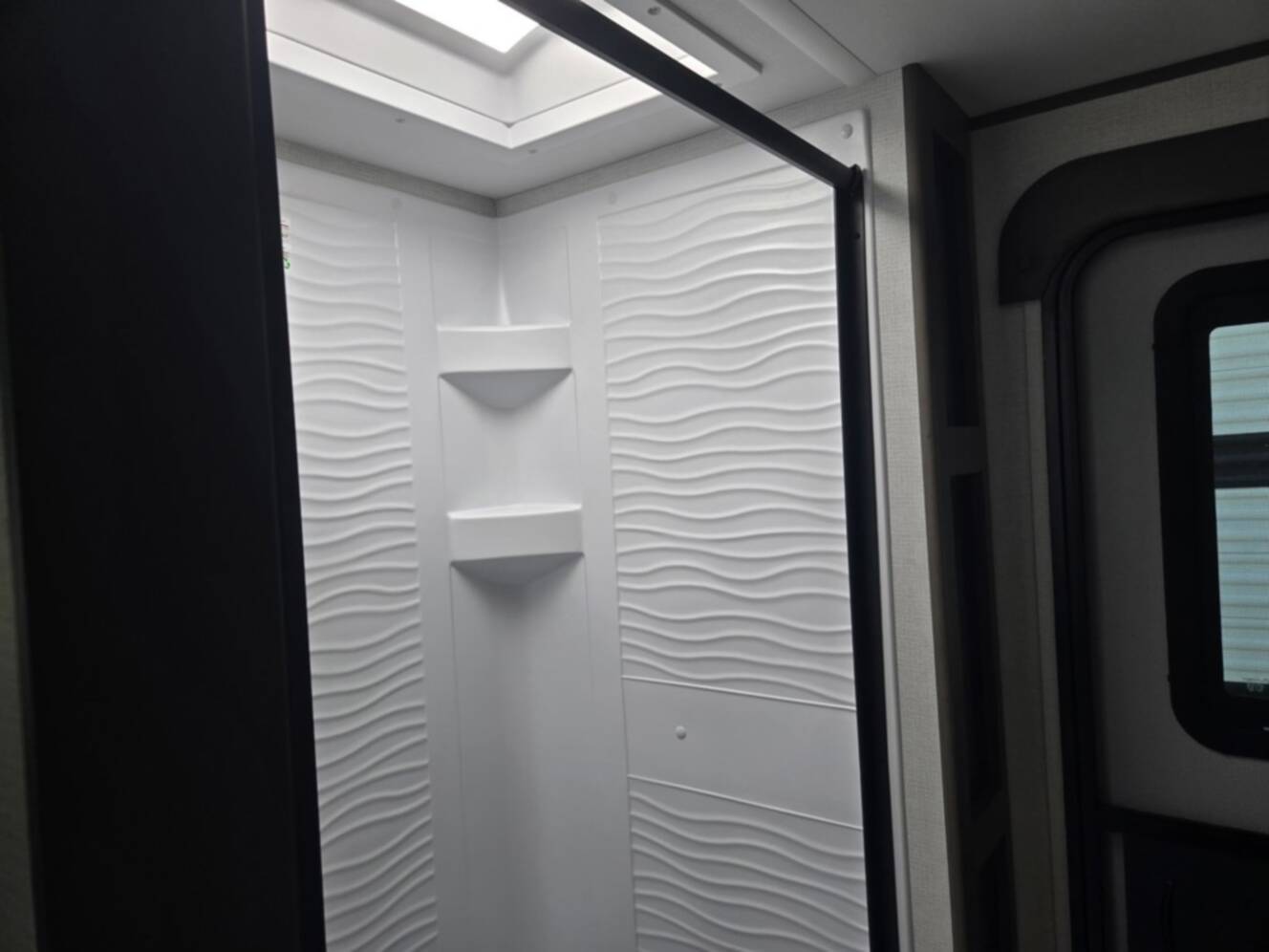 A photo of this 2026 Grand Design Transcend 325BHT