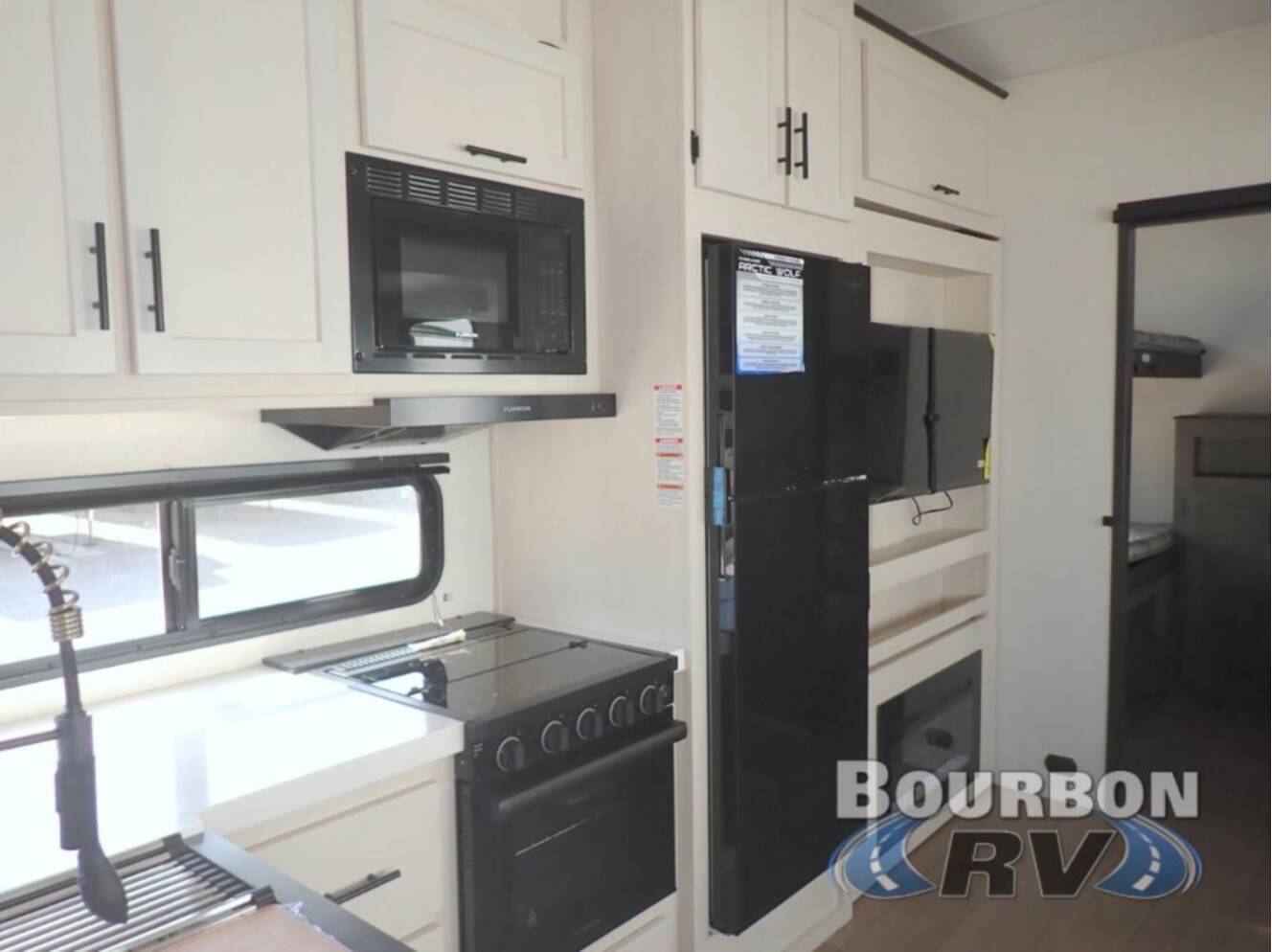 A photo of this 2026 Forest River Rv Cherokee Arctic Wolf 285OPT
