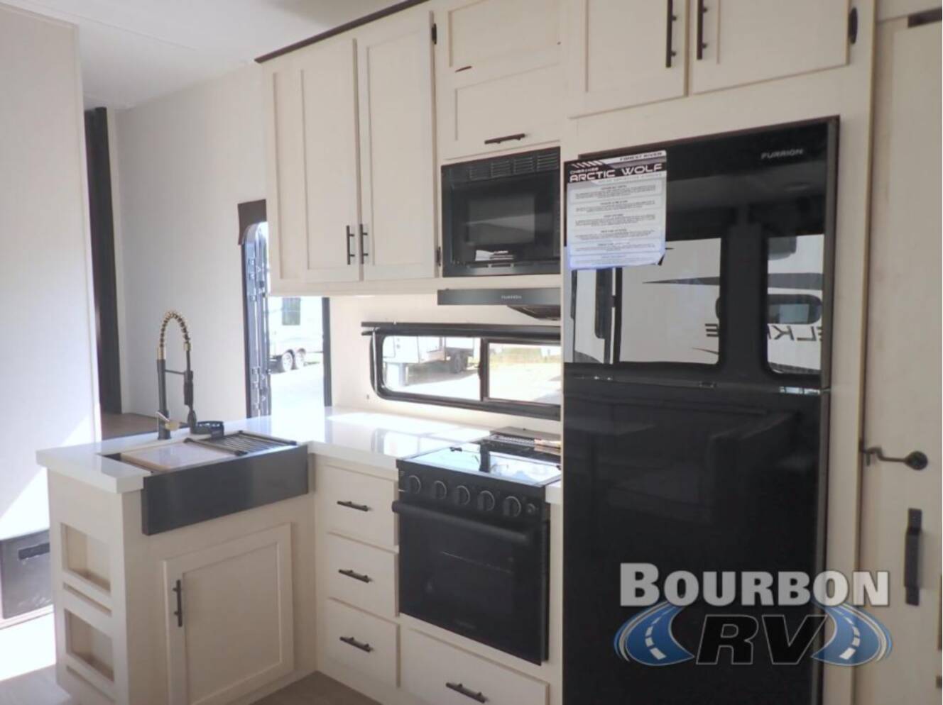 A photo of this 2026 Forest River Rv Cherokee Arctic Wolf 285OPT