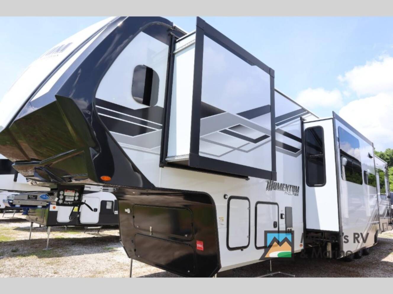 A photo of this 2026 Grand Design Momentum M-Class 392M