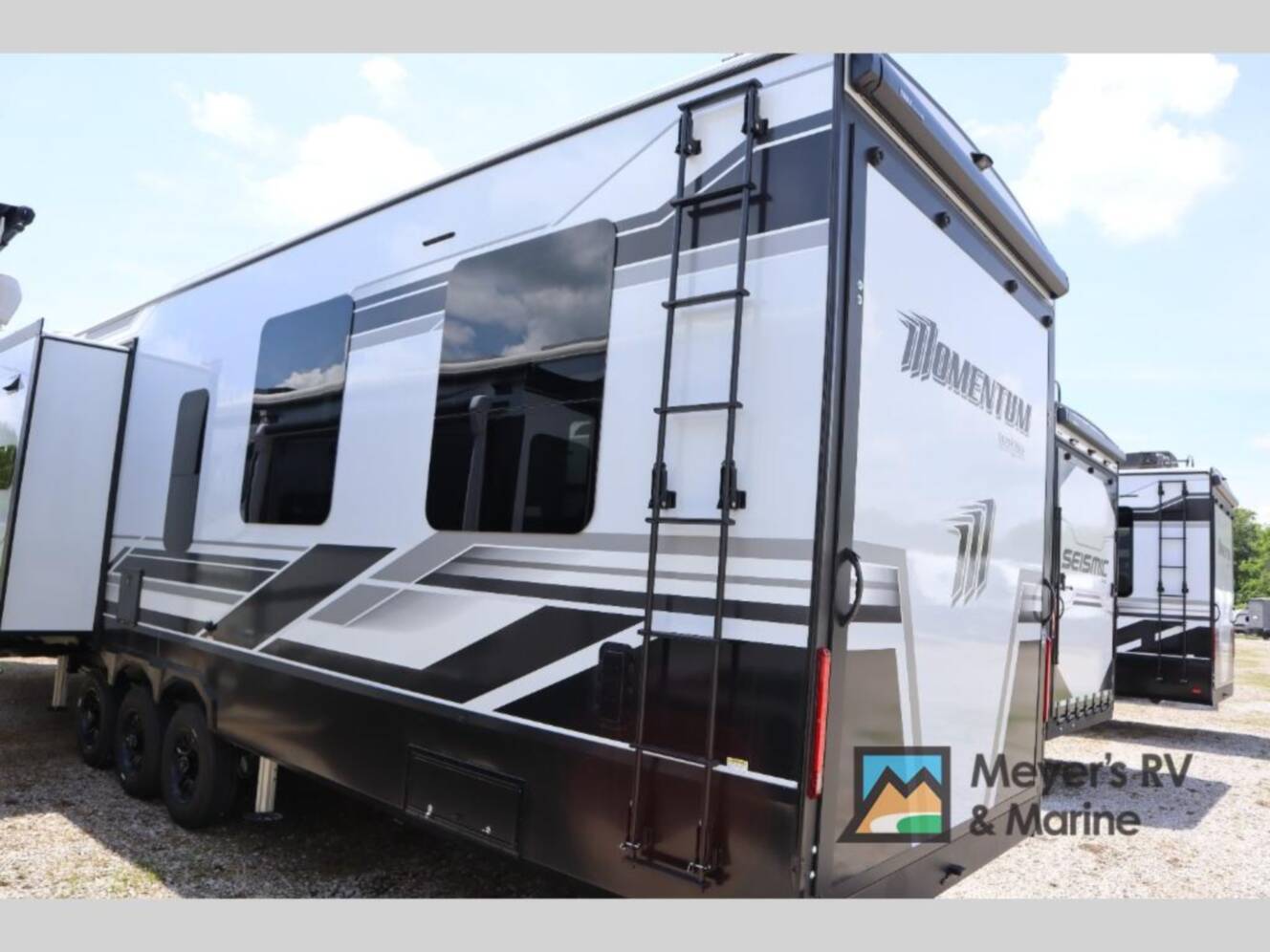 A photo of this 2026 Grand Design Momentum M-Class 392M