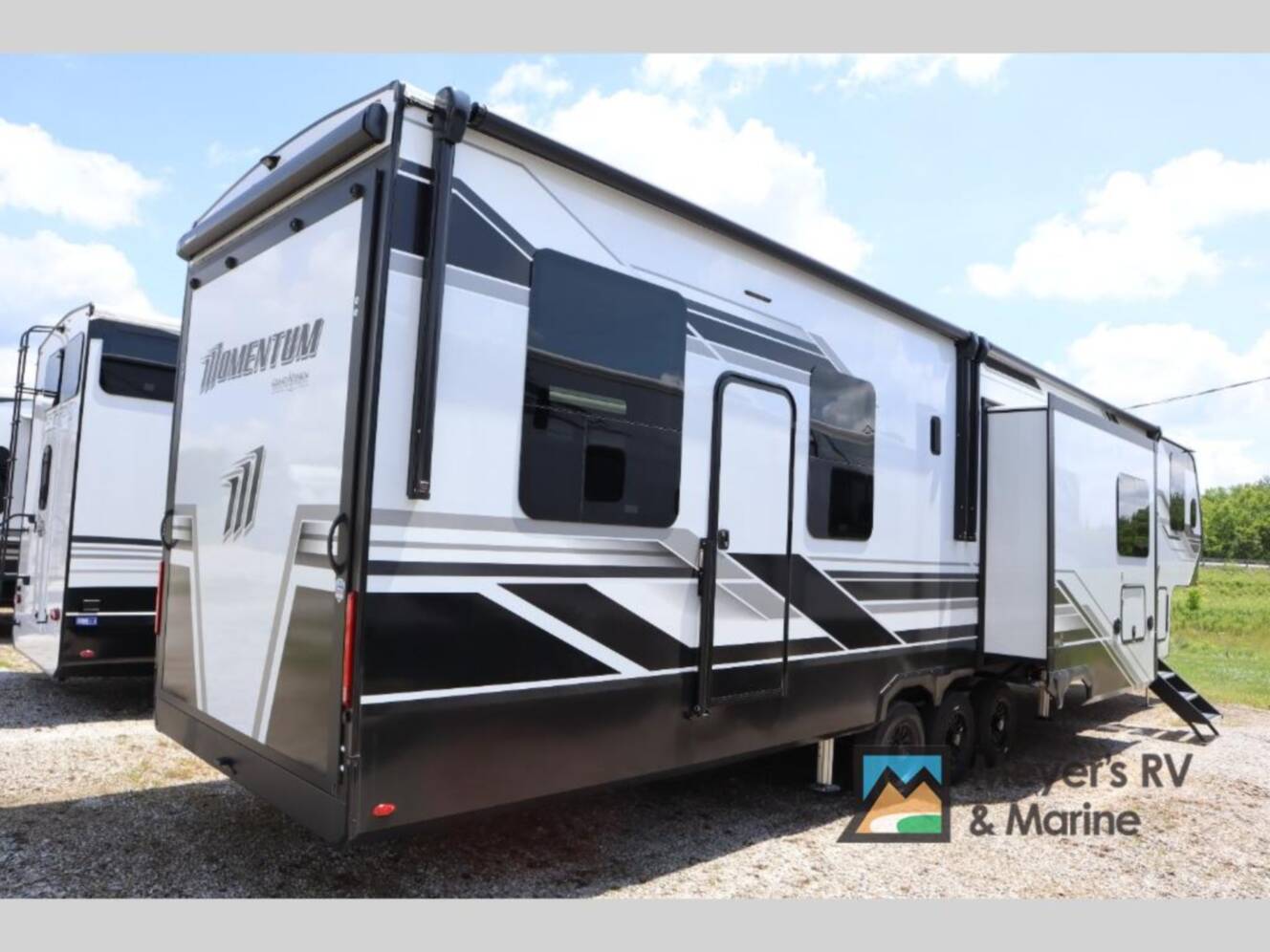 A photo of this 2026 Grand Design Momentum M-Class 392M