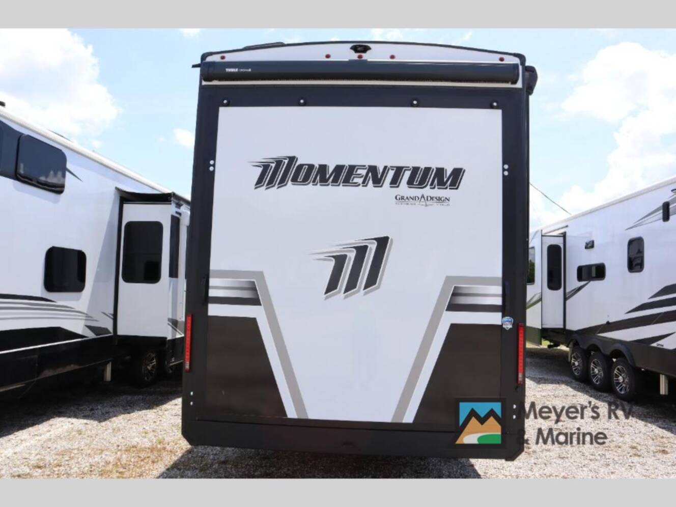 A photo of this 2026 Grand Design Momentum M-Class 392M
