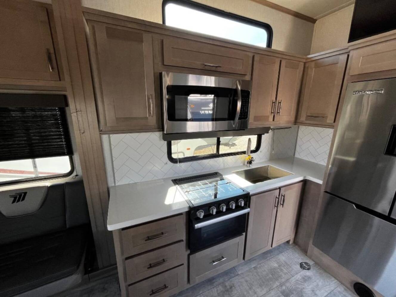 A photo of this 2024 Grand Design Momentum G-Class 355G