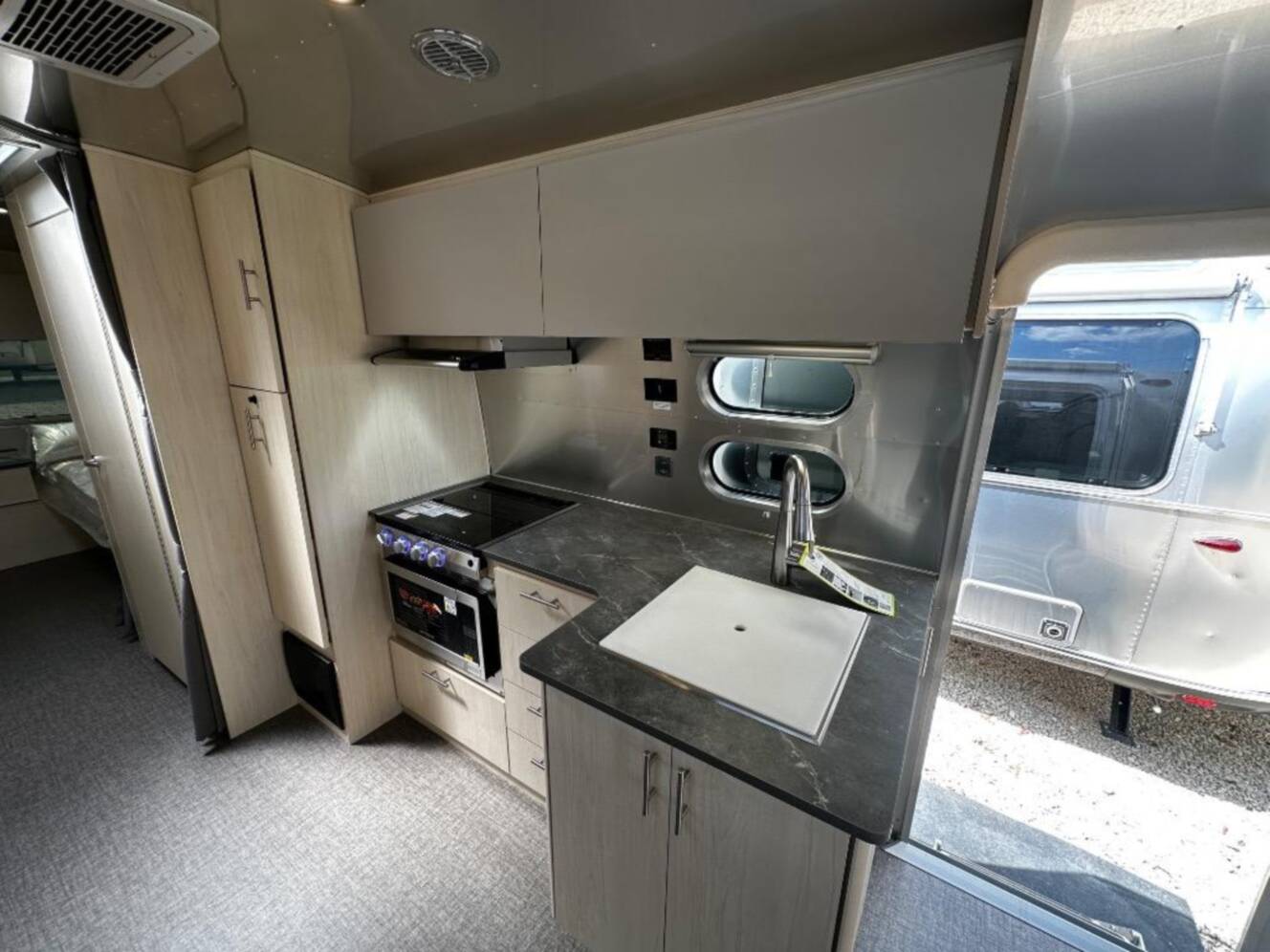 A photo of this 2026 Airstream Flying Cloud Twin Hatch with Lithium and Solar 27FB Twi