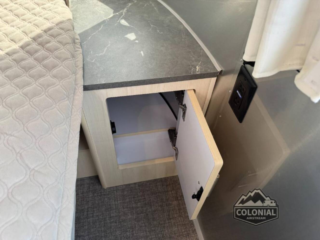 A photo of this 2026 Airstream Flying Cloud 27FBQ Queen Hatch