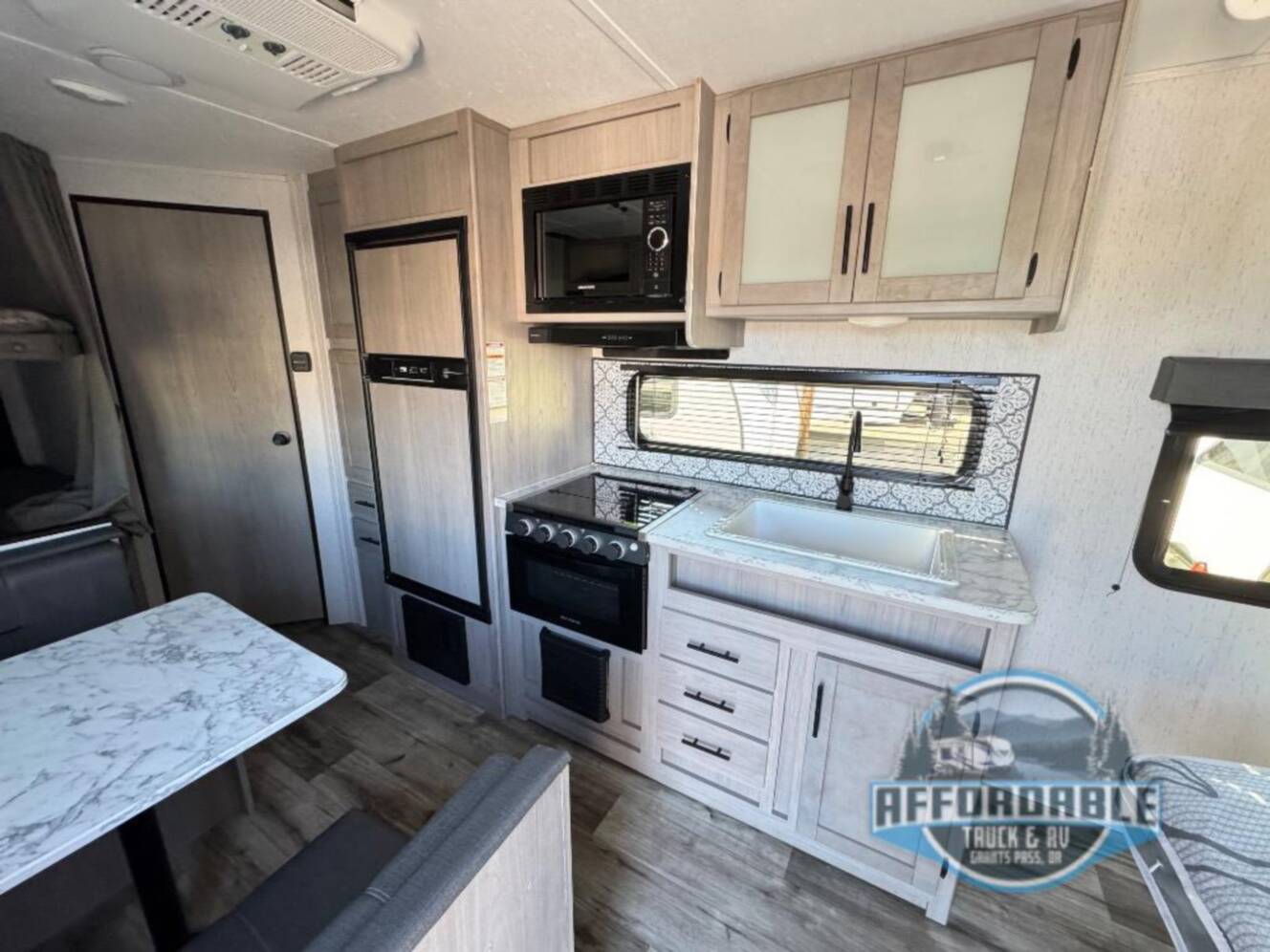 A photo of this 2022 Dutchmen Rv Coleman Lantern LT Series 214BH