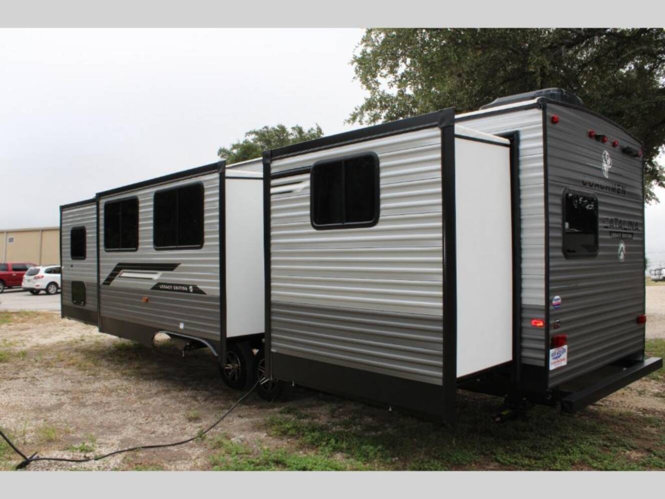 A photo of this 2026 Coachmen Rv Catalina Legacy Edition 343BHTS 2 Queen Beds