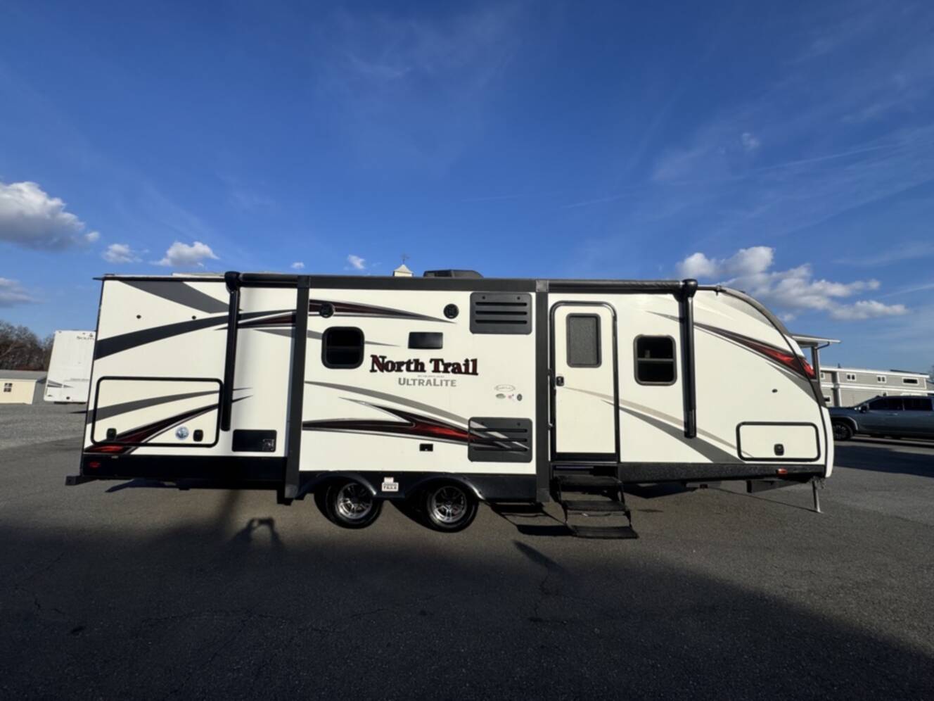A photo of this 2017 Heartland NORTH TRAIL CALIBER 27RBDS