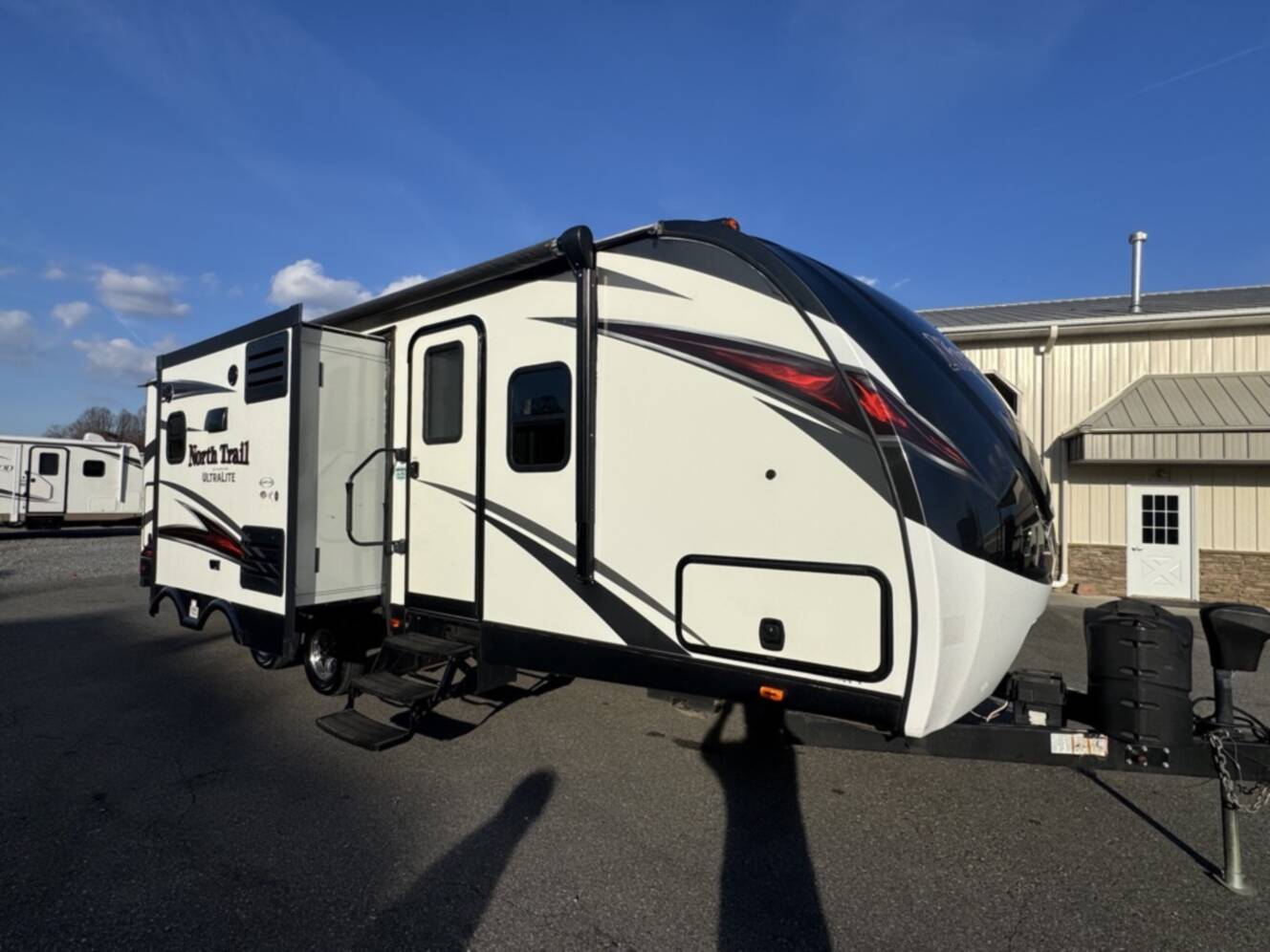 A photo of this 2017 Heartland NORTH TRAIL CALIBER 27RBDS