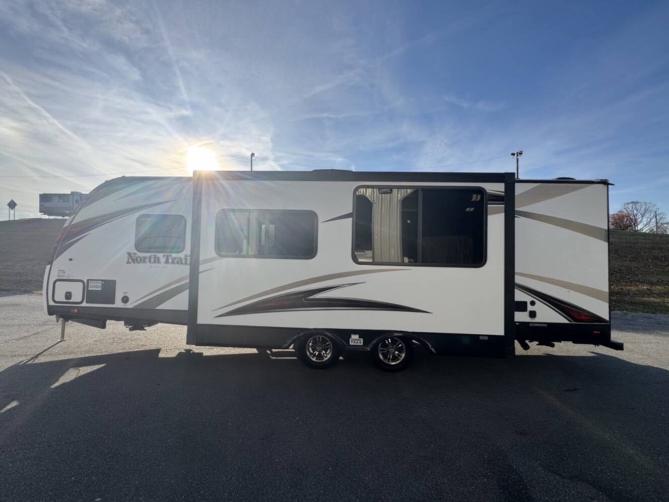 A photo of this 2017 Heartland NORTH TRAIL CALIBER 27RBDS