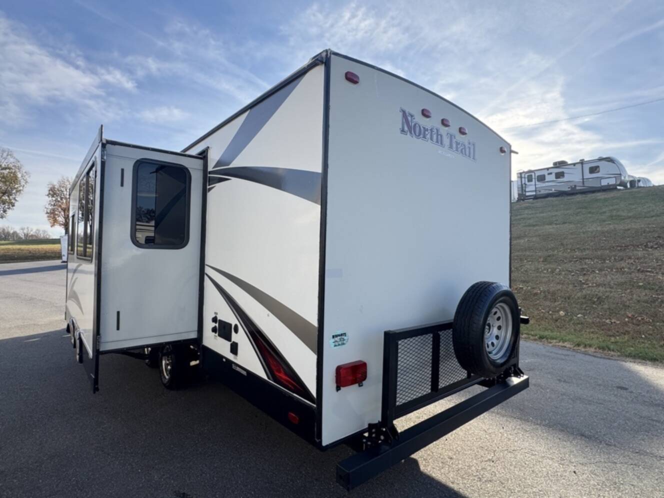 A photo of this 2017 Heartland NORTH TRAIL CALIBER 27RBDS