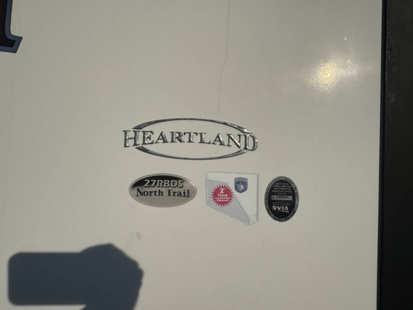 A photo of this 2017 Heartland NORTH TRAIL CALIBER 27RBDS